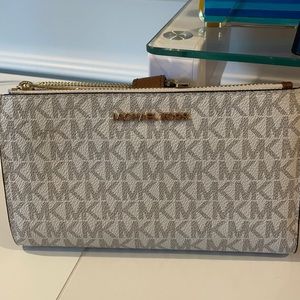 Michael Kors wristlet with phone holder